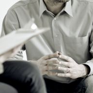 a man talking to a mediator