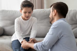 Father helping children through divorce